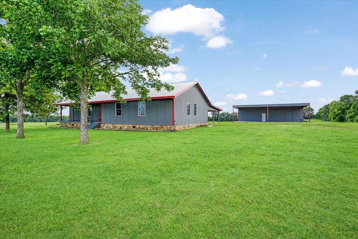 70.2 Acres of Land with Home for Sale in Paris, Texas