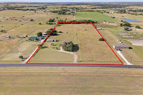 11.6 Acres of Land with Home for Sale in Godley, Texas