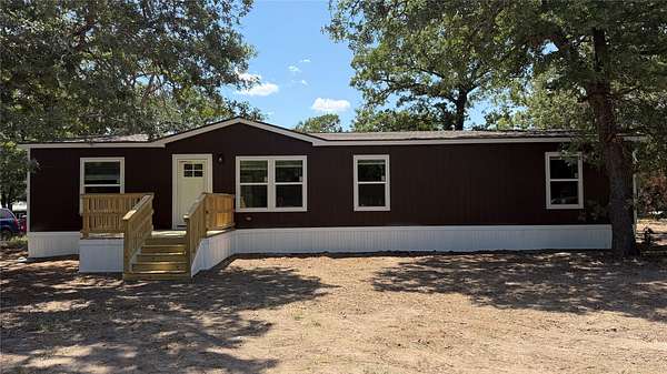 2.5 Acres of Land with Home for Sale in Scurry, Texas