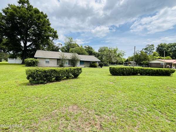 1.6 Acres of Land with Home for Sale in Sneads, Florida