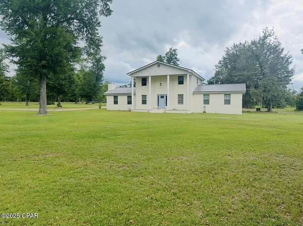 5 Acres of Land with Home for Sale in Marianna, Florida