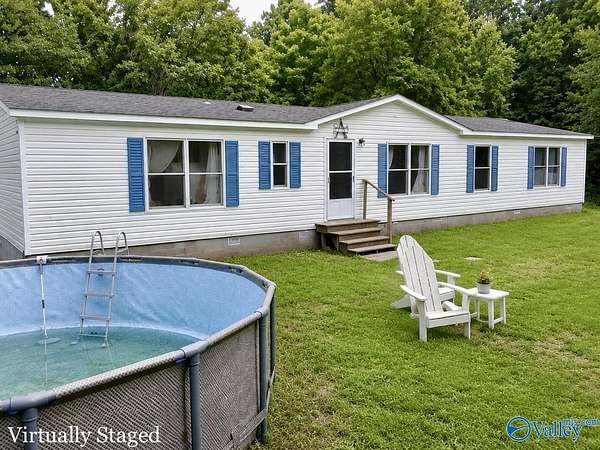 9.3 Acres of Land with Home for Sale in Albertville, Alabama