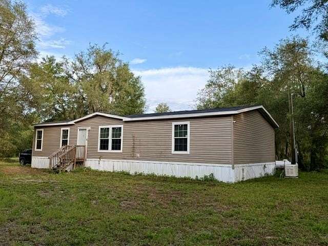 8.57 Acres of Land with Home for Sale in Branford, Florida