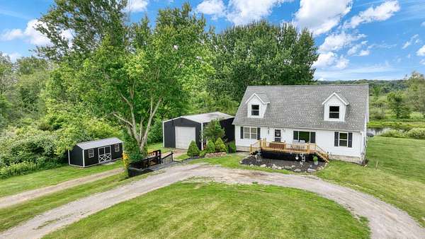 5.8 Acres of Land with Home for Sale in Rives Junction, Michigan