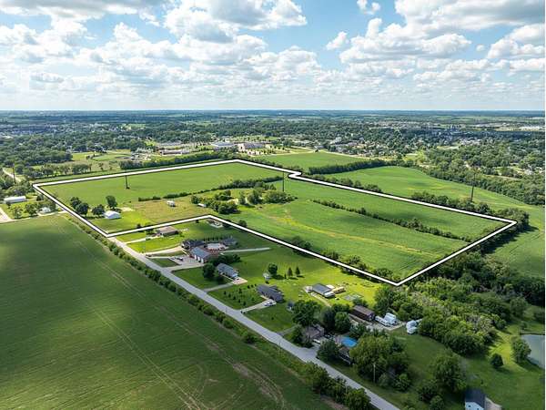 88.9 Acres of Recreational Land with Home for Auction in Norwalk, Iowa