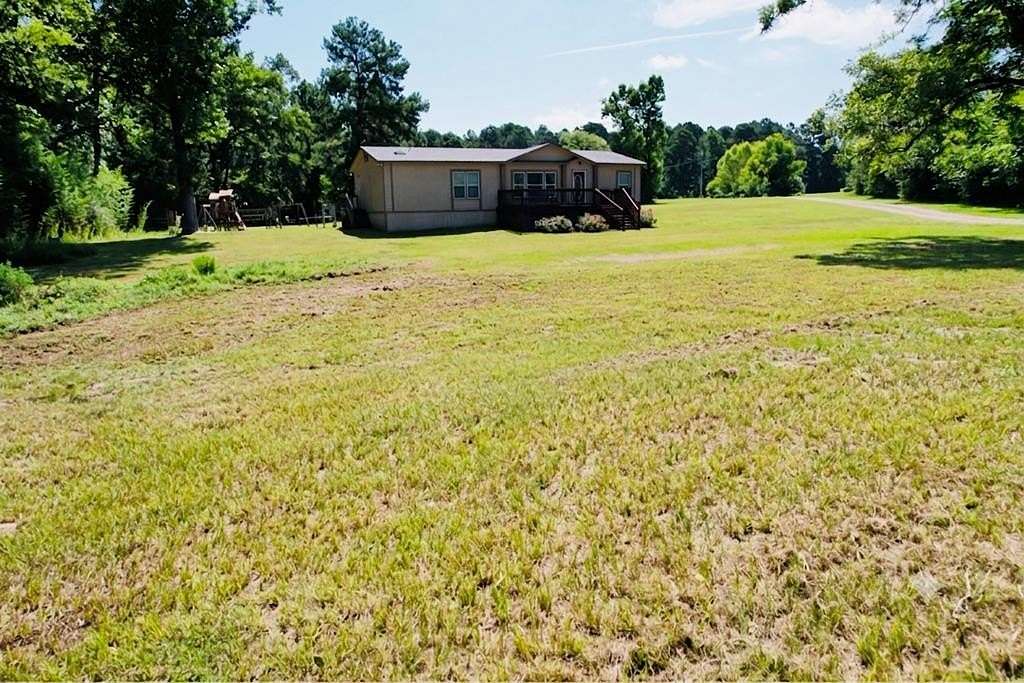 1.5 Acres of Land with Home for Sale in Lufkin, Texas