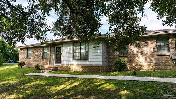 3 Acres of Land with Home for Sale in Cantonment, Florida
