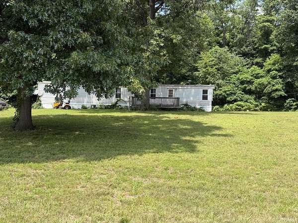 36.7 Acres of Land with Home for Sale in Grovertown, Indiana