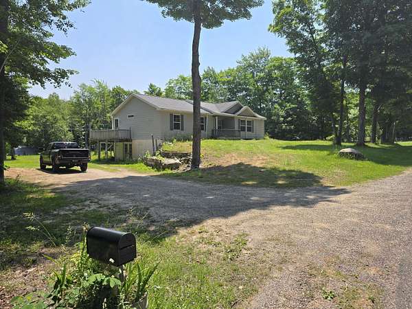 2.5 Acres of Land with Home for Sale in Kinross, Michigan