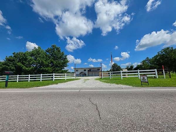 15 Acres of Land with Home for Sale in Fair Grove, Missouri