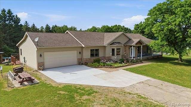 10 Acres of Land with Home for Sale in Groveland Township, Michigan