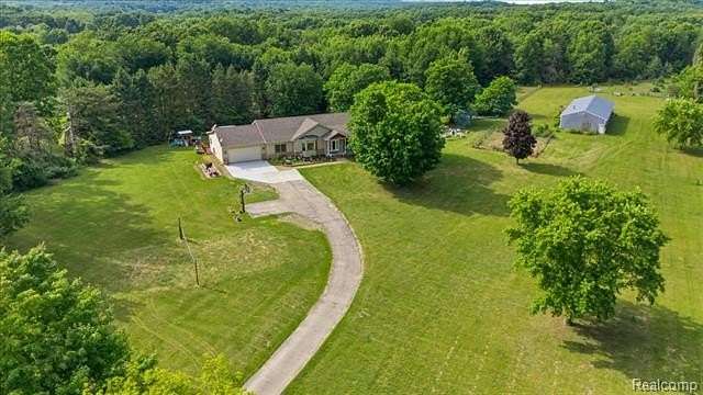 10 Acres of Land with Home for Sale in Groveland Township, Michigan
