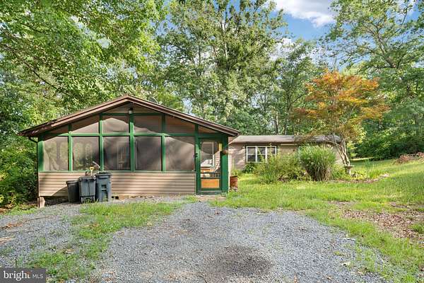 5 Acres of Land with Home for Sale in Hedgesville, West Virginia