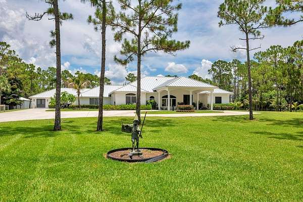 5 Acres of Land with Home for Sale in Palm Beach Gardens, Florida