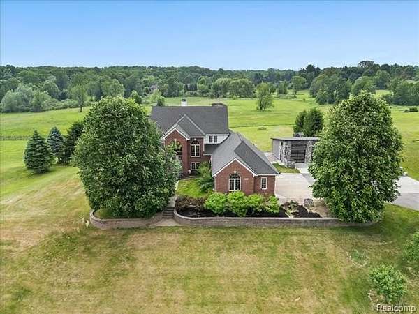 2.54 Acres of Land with Home for Sale in Oakland Charter Township, Michigan