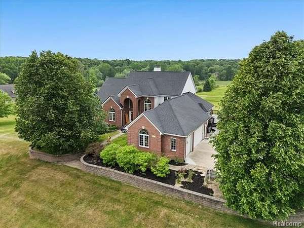 2.54 Acres of Land with Home for Sale in Oakland Charter Township, Michigan