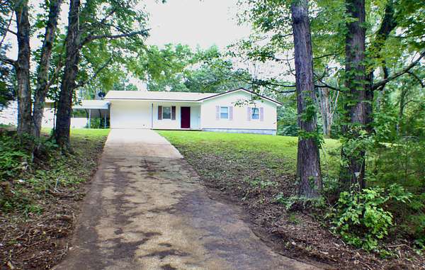1.6 Acres of Land with Home for Sale in Olivehill, Tennessee