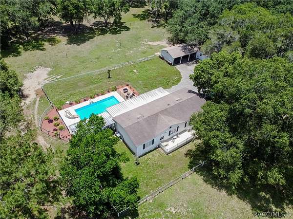 4.8 Acres of Land with Home for Sale in Floral City, Florida