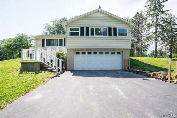 7.3 Acres of Land with Home for Sale in Basom, New York