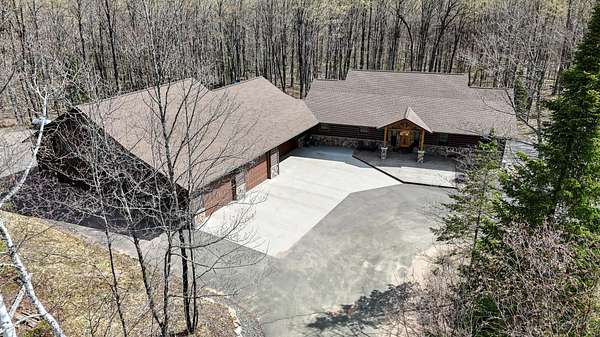 3.85 Acres of Land with Home for Sale in Manitowish Waters, Wisconsin