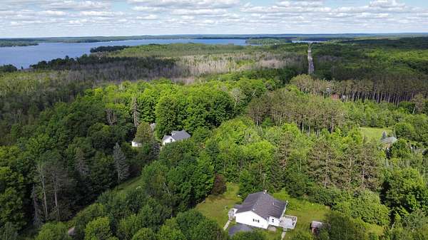 4.5 Acres of Land with Home for Sale in Pelican Lake, Wisconsin