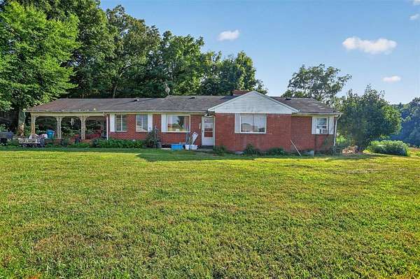 13.2 Acres of Land with Home for Sale in Austin, Kentucky