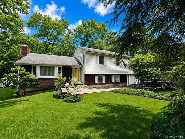 1 Acre of Land with Home for Sale in Dix Hills, New York