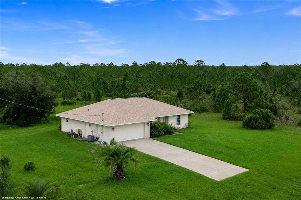 11 Acres of Recreational Land with Home for Sale in Venus, Florida