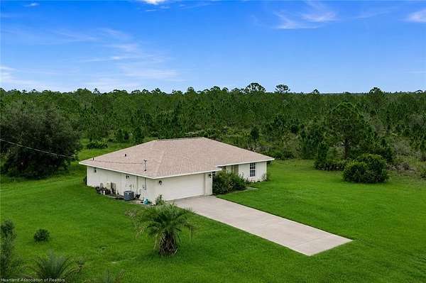 11 Acres of Recreational Land with Home for Sale in Venus, Florida