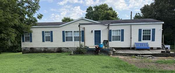 8 Acres of Land with Home for Sale in Arlington, Kentucky