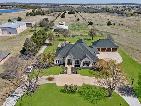 12.5 Acres of Land with Home for Sale in McLendon-Chisholm, Texas