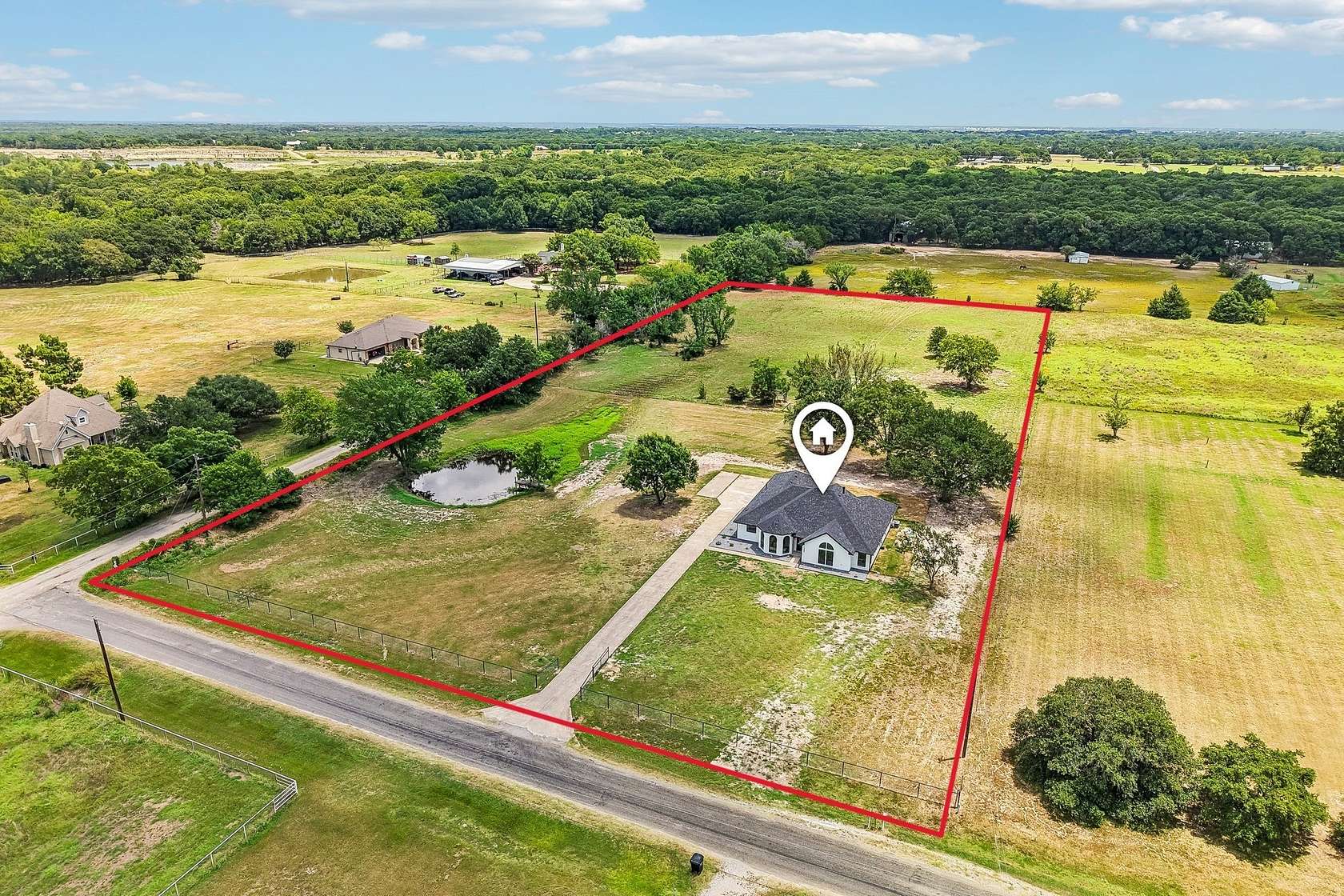 4.47 Acres of Land with Home for Sale in Terrell, Texas