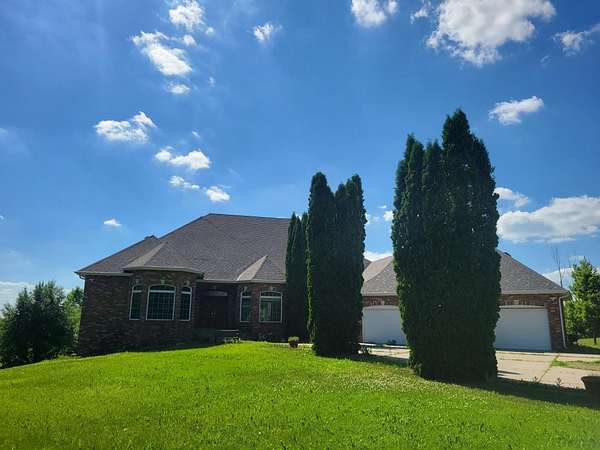 8 Acres of Land with Home for Sale in Loretto, Minnesota