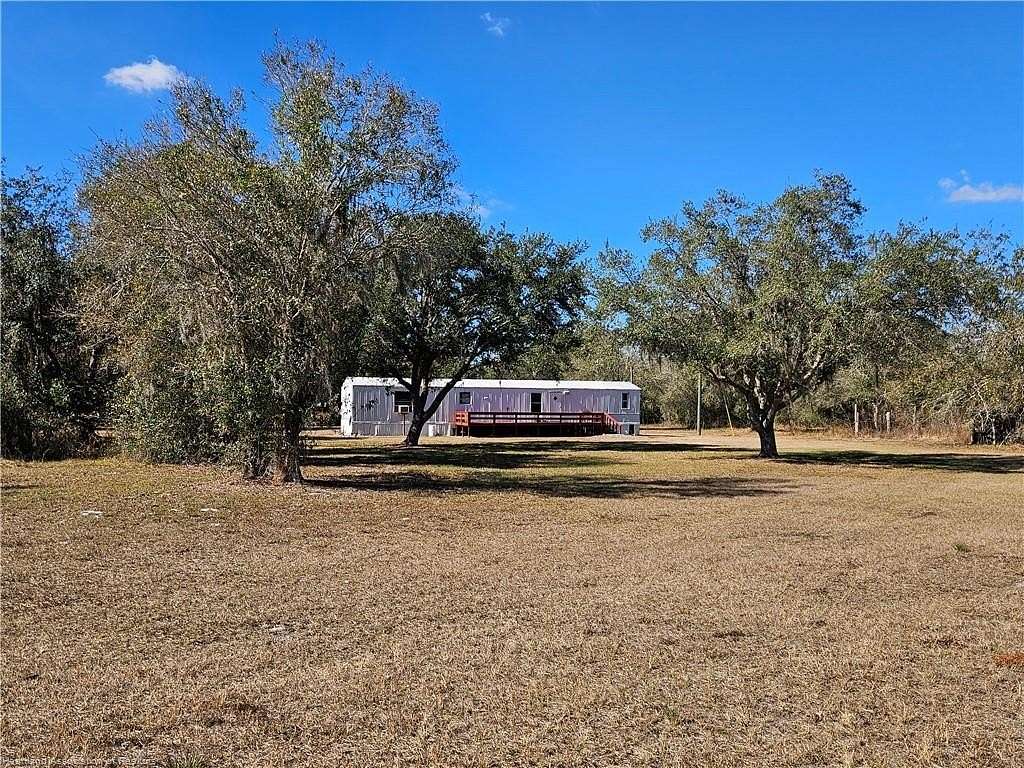 5 Acres of Land with Home for Sale in Venus, Florida