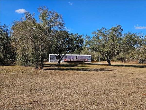 5 Acres of Land with Home for Sale in Venus, Florida
