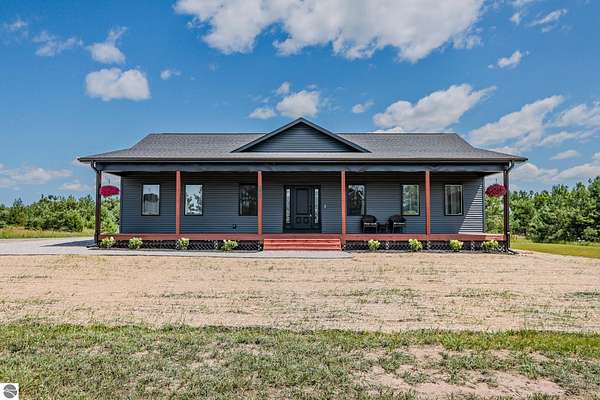 1.52 Acres of Land with Home for Sale in Elmira, Michigan