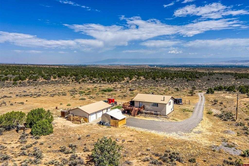 4.82 Acres of Land with Home for Sale in Montrose, Colorado
