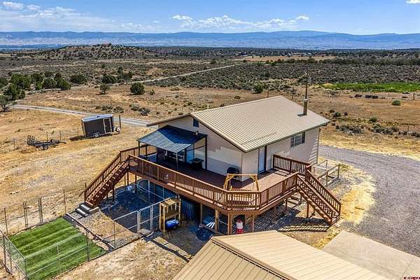 4.82 Acres of Land with Home for Sale in Montrose, Colorado