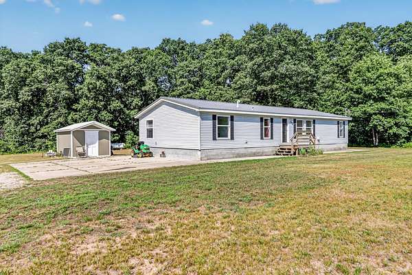 3 Acres of Land with Home for Sale in Holton, Michigan