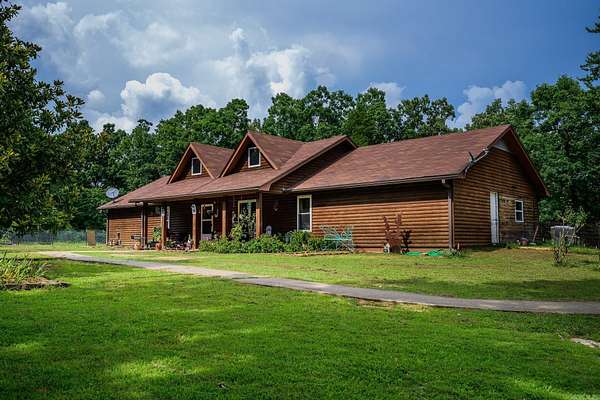 3.74 Acres of Land with Home for Sale in Mena, Arkansas