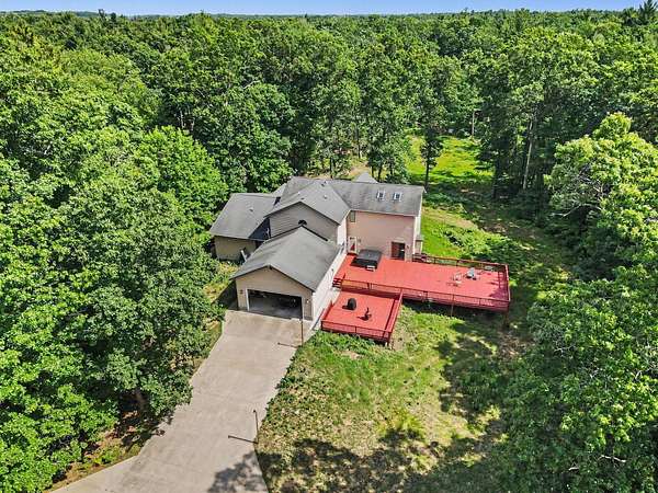 60.8 Acres of Recreational Land with Home for Sale in Whitehall, Michigan