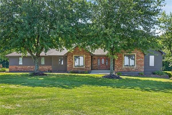 5.5 Acres of Land with Home for Sale in Raymore, Missouri