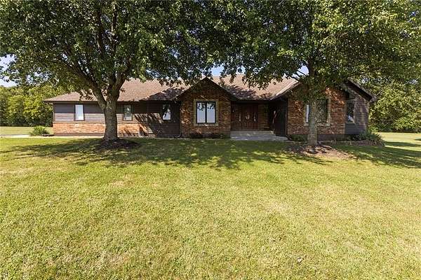 5.5 Acres of Land with Home for Sale in Raymore, Missouri