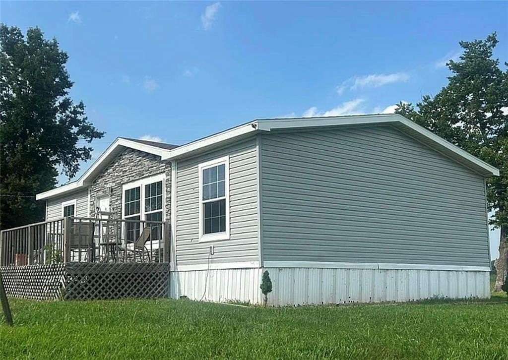 10 Acres of Land with Home for Sale in Urich, Missouri