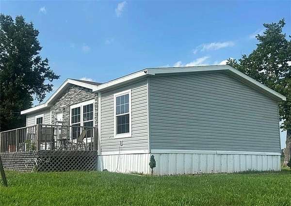 10 Acres of Land with Home for Sale in Urich, Missouri