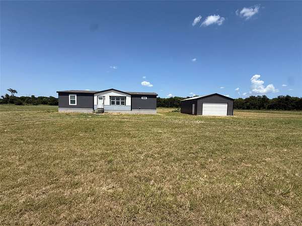 2.5 Acres of Land with Home for Sale in Paris, Texas