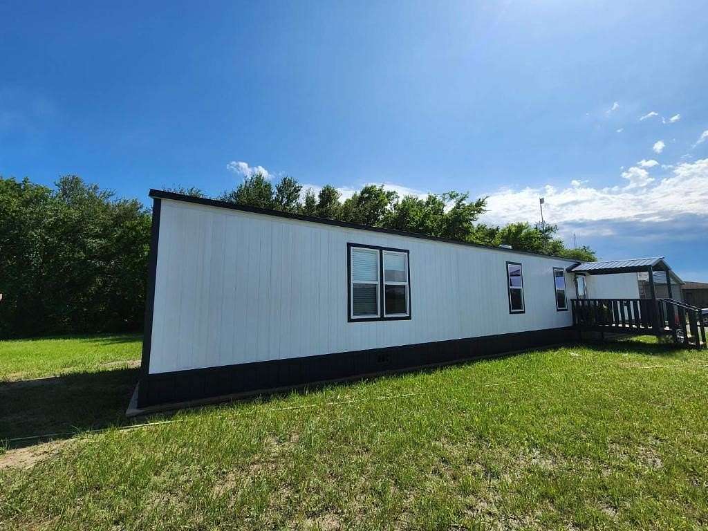 6.88 Acres of Land with Home for Sale in Howe, Texas