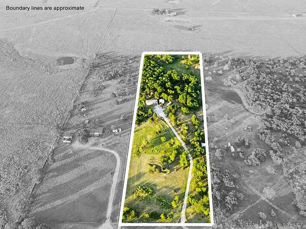 9.3 Acres of Land with Home for Sale in Powell, Texas