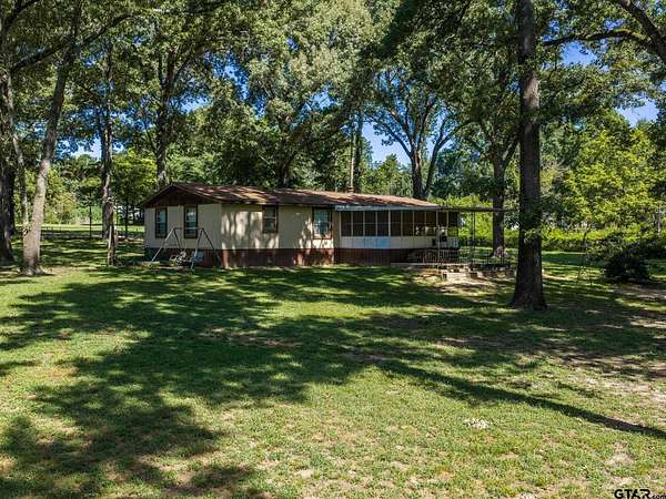 1.77 Acres of Land with Home for Sale in Chandler, Texas