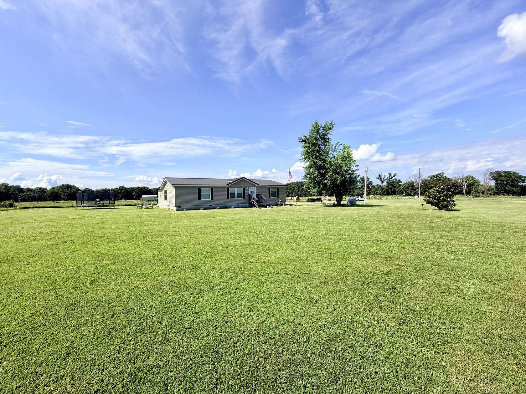 20.1 Acres of Recreational Land with Home for Sale in Wyandotte, Oklahoma